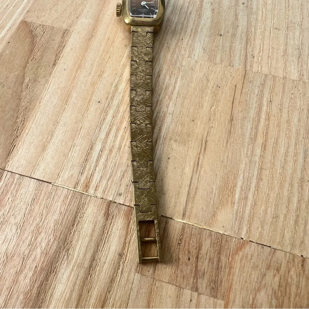 Vintage Jules Jurgensen ladies gold tone bronze tone mechanical dress watch